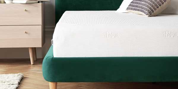 Green velvet bed with tempur mattress.